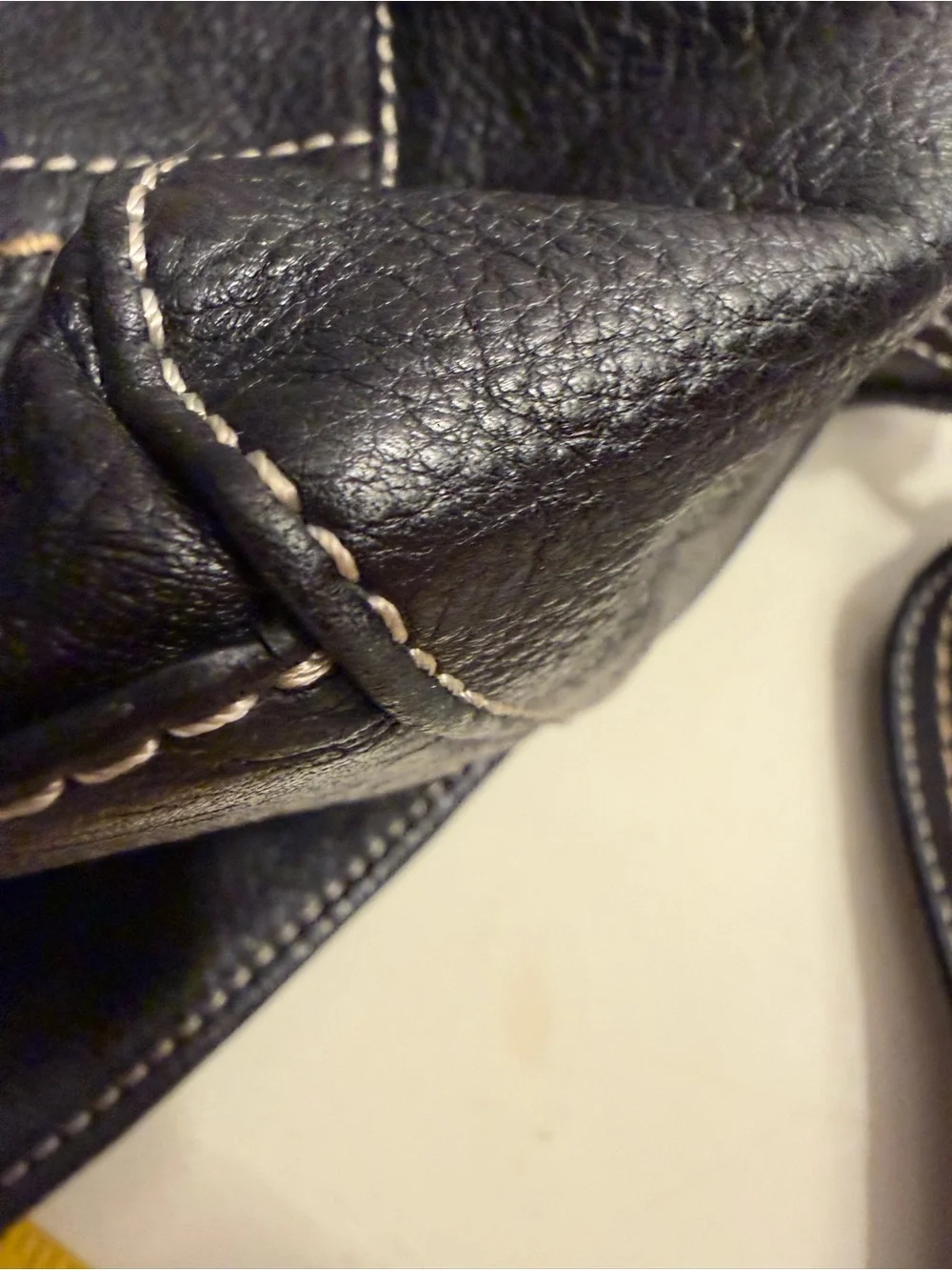 The Sak “PO Asbury” large pebbled black leather hobo/shoulder bag.